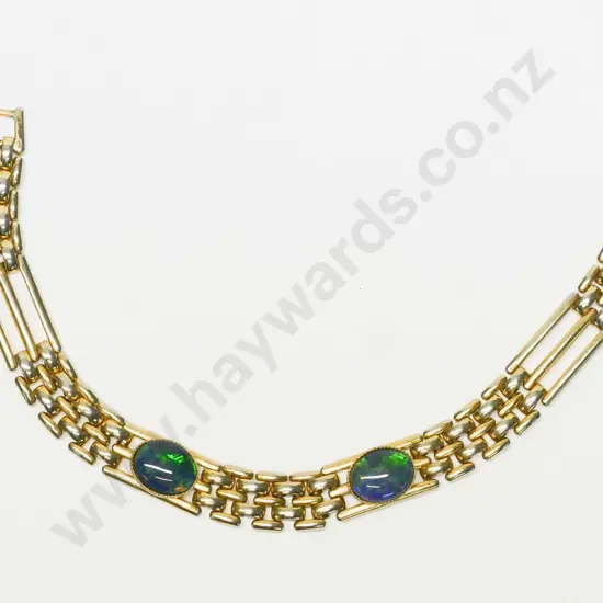 gold plated bracelet with 2 coloured stones