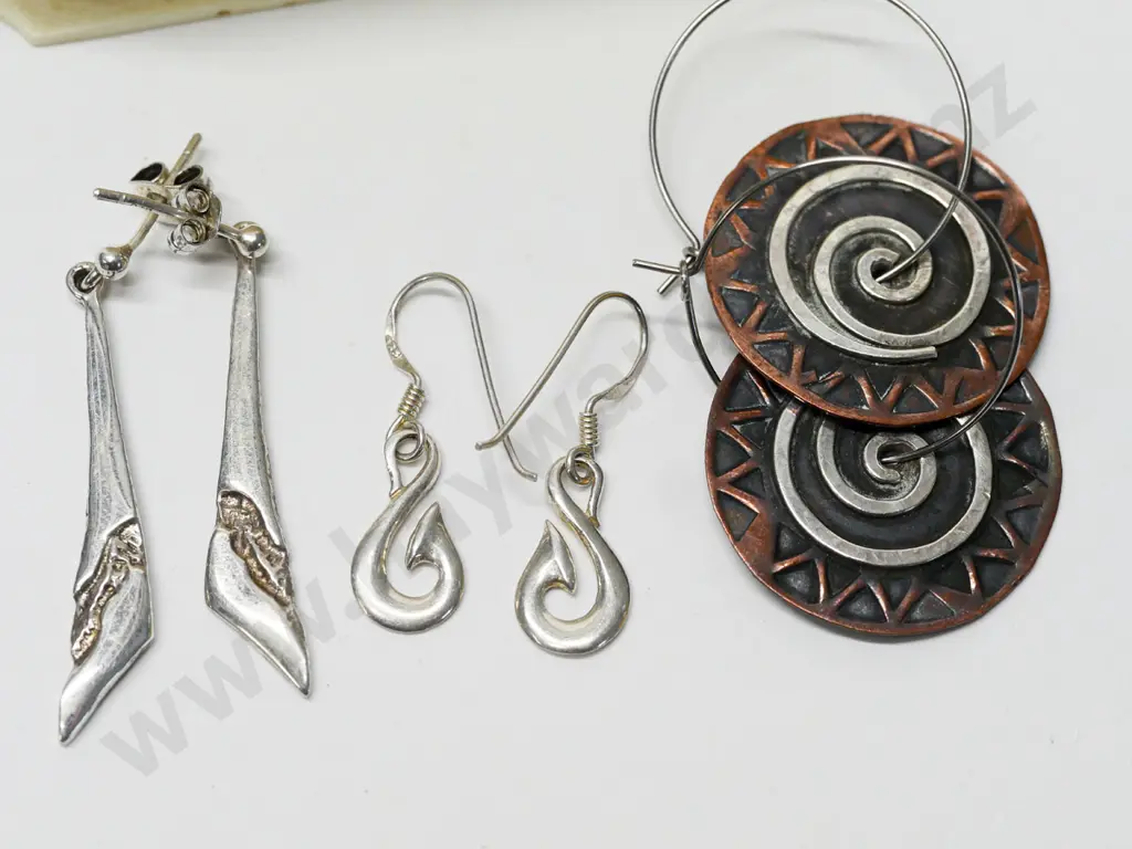 3 pairs of earrings - stamped 925 on hoop no marks on the other 2 in a bakelite container with Studs written on top Image 1++