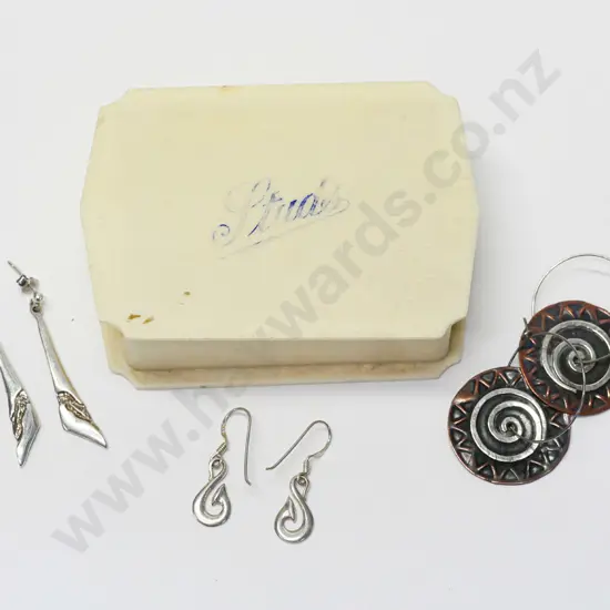 3 pairs of earrings - stamped 925 on hoop no marks on the other 2 in a bakelite container with Studs written on top