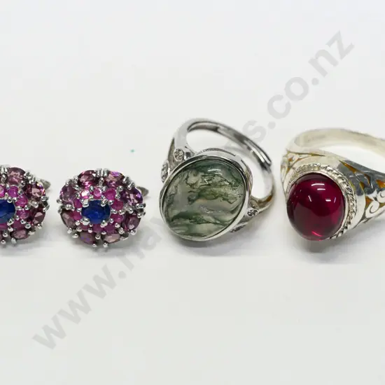 2 silver dress rings both stamped 925 & a pair of earrings