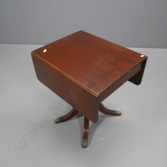 reproduction drop-side occasional table on pedestal base, brass claw feet, had repair to leg H-530 L-750 Extended W-480