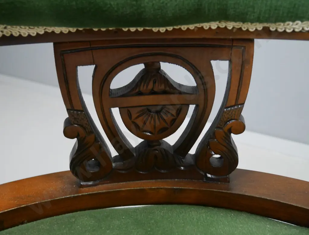 vintage tub chair with carved splats, turned legs, on porcelain casters, some wear to upholstery H-700 W-620 D-620 Image 1++