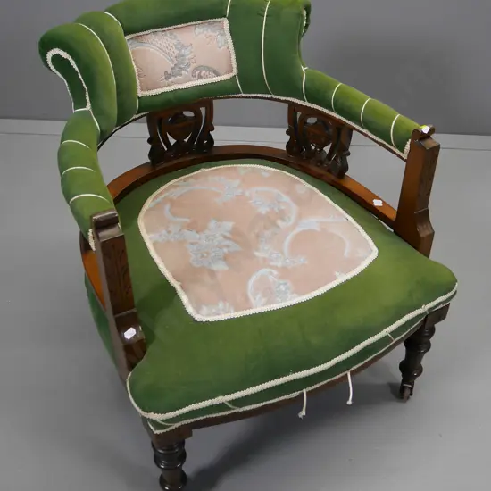 vintage tub chair with carved splats, turned legs, on porcelain casters, some wear to upholstery H-700 W-620 D-620