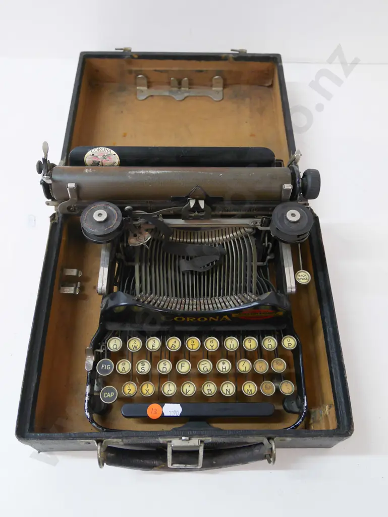 small vintage cased Corona portable typewriter - supplier Johnson & Hardy Dunedin Image 1++