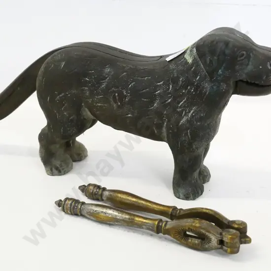 cast metal dog nutcracker and a small cast brass handheld nutcracker H-120 L-290