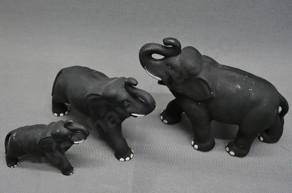 3 English (Sylvac?) black matte glaze china elephants, marked 769 & 768L, no number on largest, numerous flecks to glaze Image 1++
