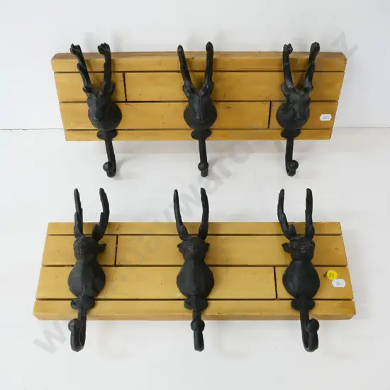 pair of cast iron and wood coat hook boards - 3 stag's head shaped hangers on each, panels H-140 W-420