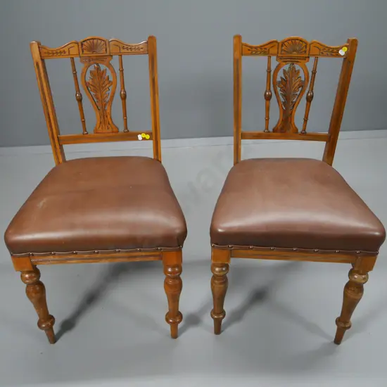 pair of Edwardian carved-back dining chairs with leather seats H-830 W-470 D-420