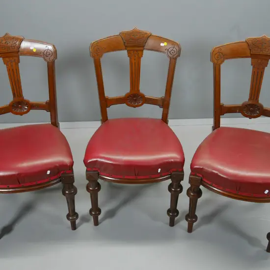 3 matching vintage mahogany carved back dining chairs with studded leatherette seats, looseness in joints H930 W460 D440