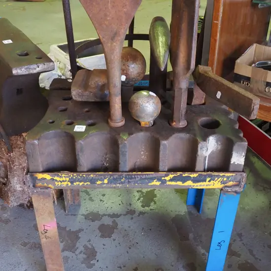 blacksmith's swale block with various accessories