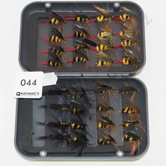 box of fly fishing flies