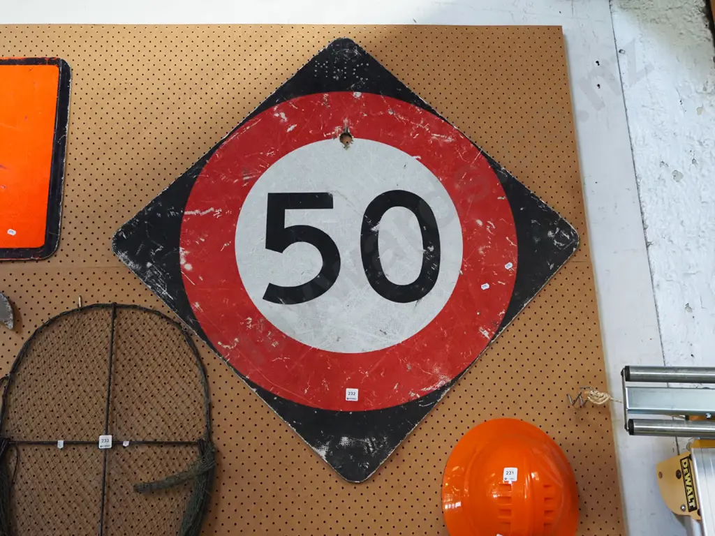 decommissioned 50 km/hr road sign Image 1++