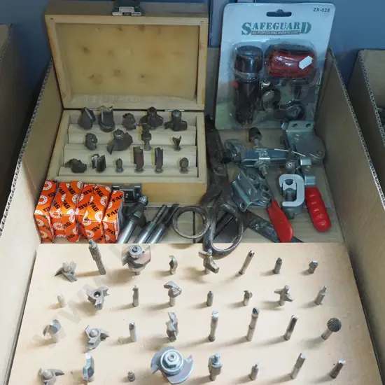 box; router bits, bike lights, bearings etc