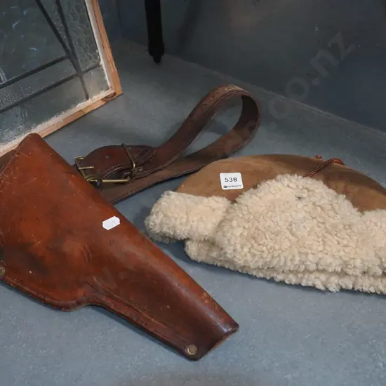 sheepskin hat, leather pistol holster