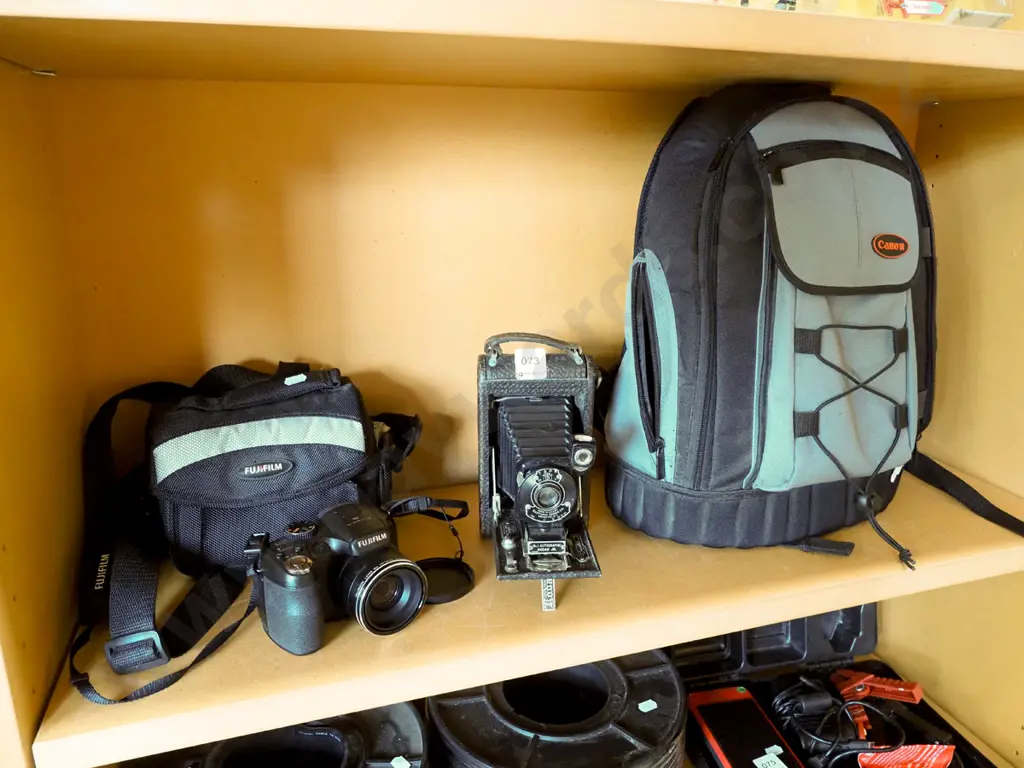 Fujifilm digital camera, vintage Kodak folding camera, Canon camera bag Image 1++