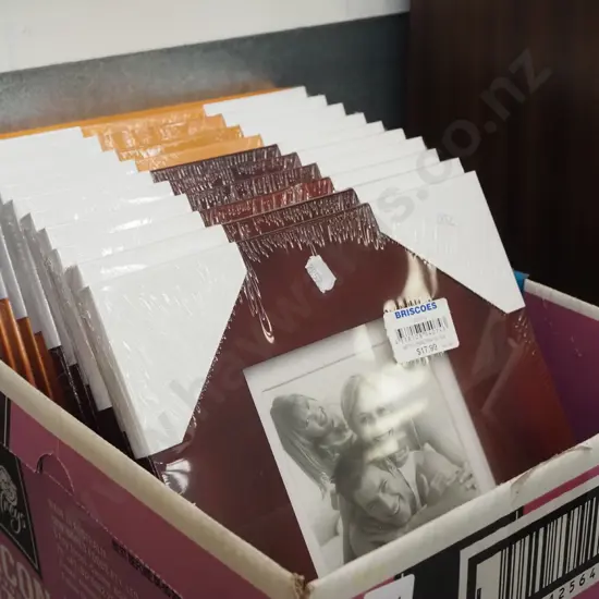 box of wooden photo frames