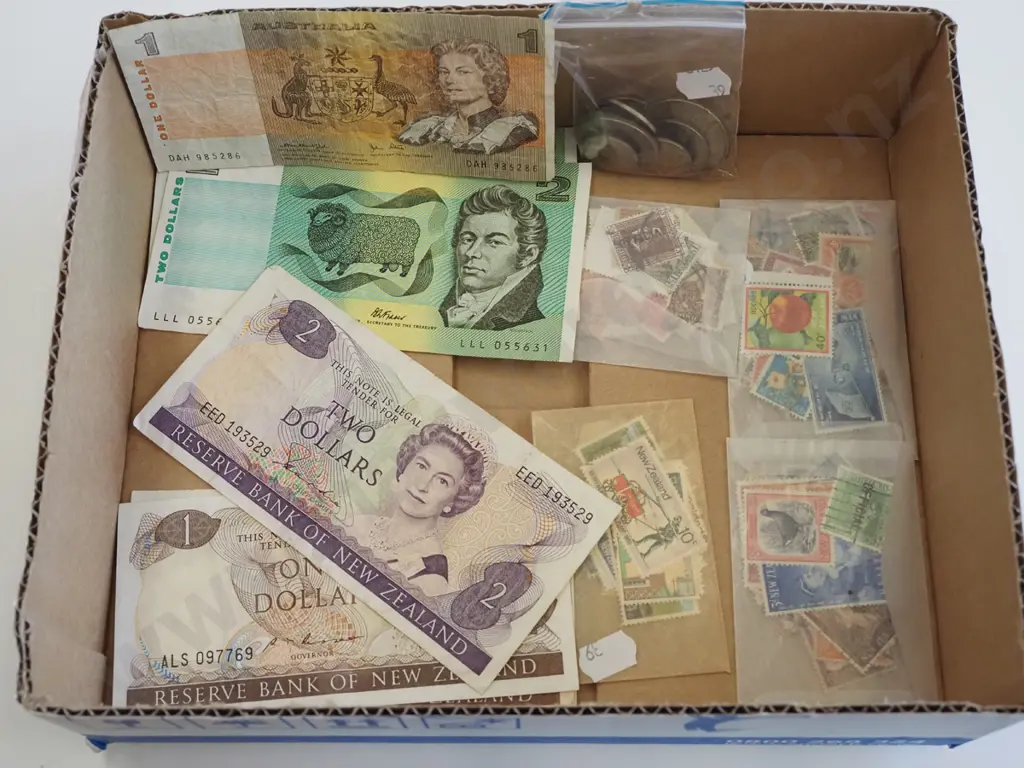 box of coins, stamps, bank notes Image 1++