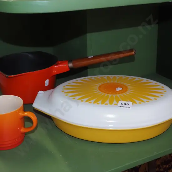 pyrex dish, cast iron and enamel pot, Le Creuset coffee cup