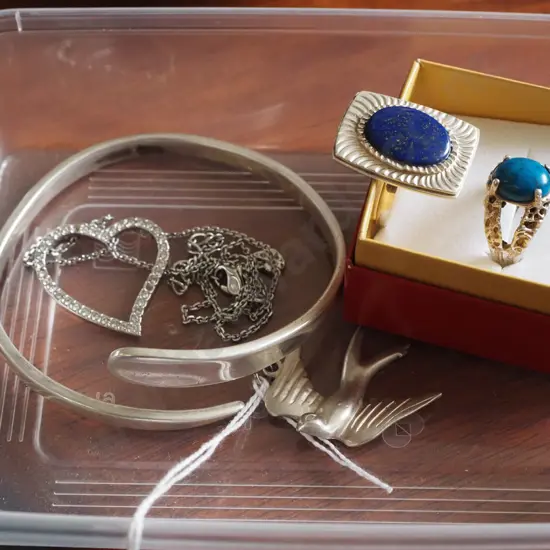 tray; sterling silver bangle, sterling silver rings, pendants
