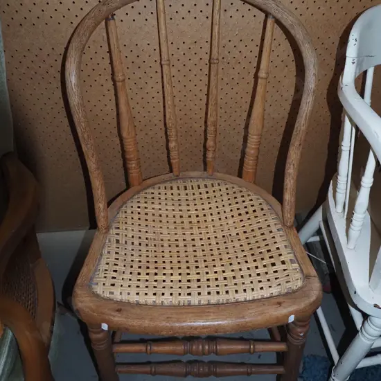 woven cane armchair