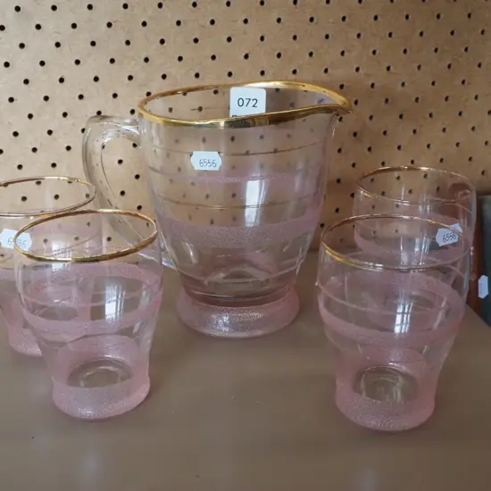 pink and gold rimmed water jug and 4 tumblers