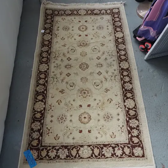 small tan and burgundy floor mat L1440 W800