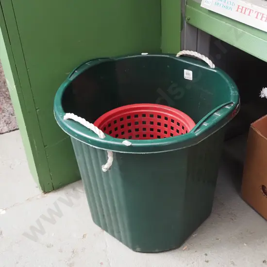 green plastic bucket, red waste paper bucket