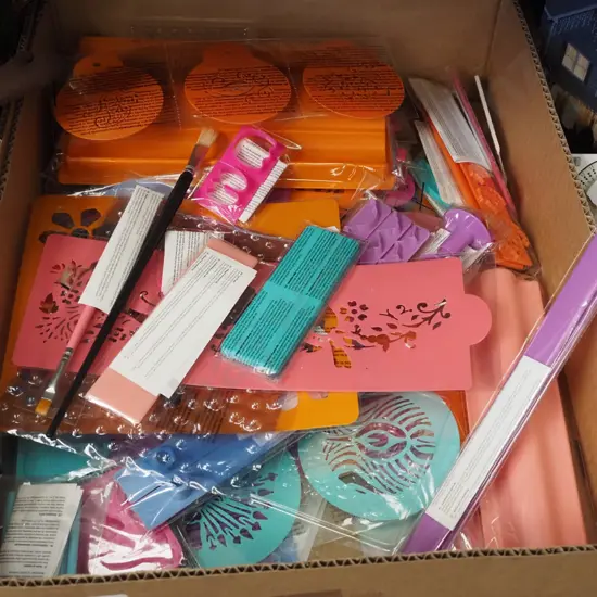 box; crafting supplies, stencils etc