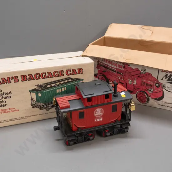2 Jim Beam railway decanters - sealed-box never-opened baggage car w/ New Jersey Central Railroad markings and a red