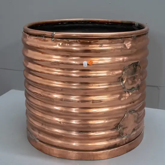 ribbed copper wood bin - no feet, original plumbing holes patched on sides and bottom H-400 D-440
