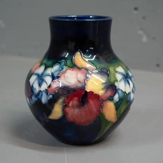 vintage Moorcroft tube lined iris vase - blue signature on base H-135 D-110 at widest