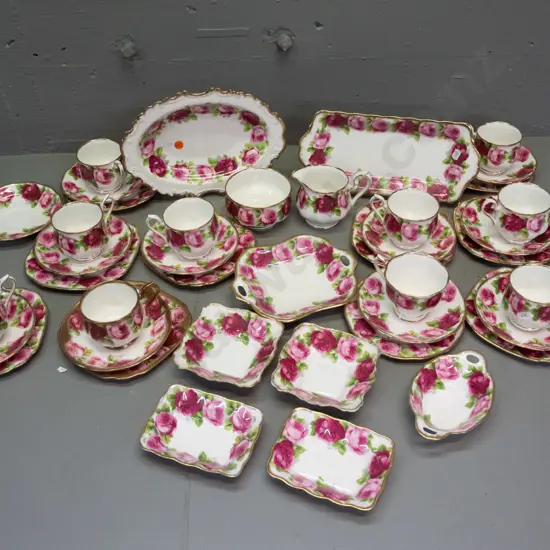 Royal Albert Old English Rose tea and serving ware - 10 trios, several cup shapes, one is heavy gilt, cream & sugar, 2