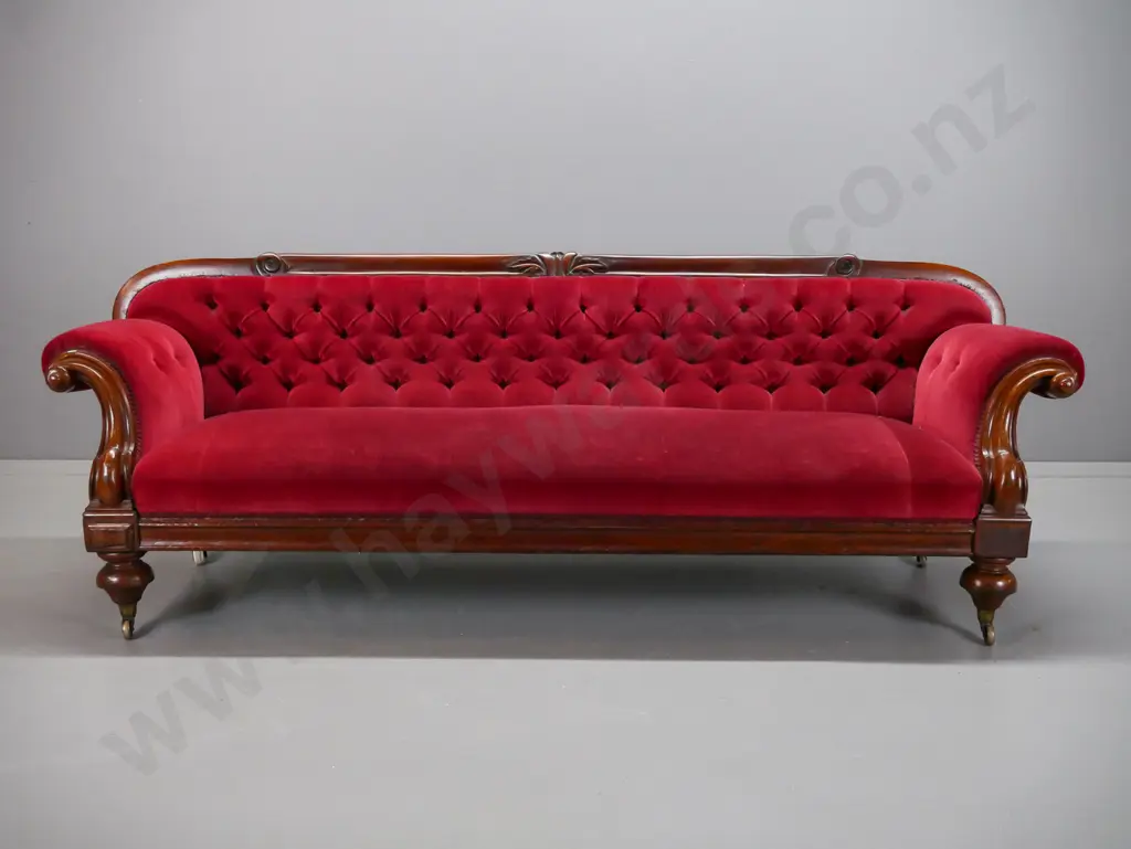 Victorian mahogany rolled-arm settee with timber framed back, carved foliate decoration, fluted arms, turned feet with Image 1++
