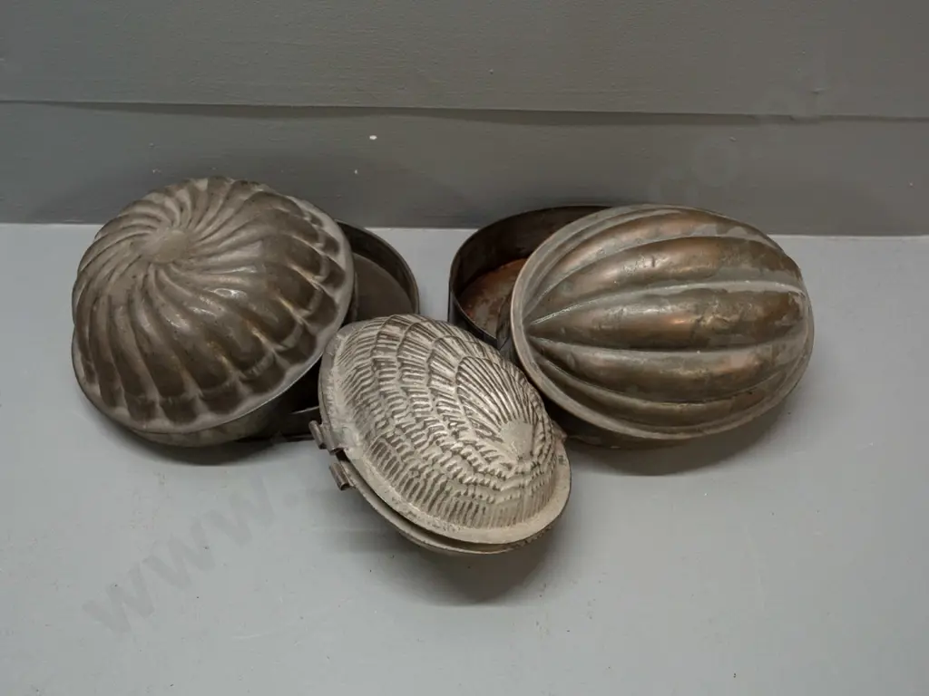 3 vintage pressed metal baking and/or chocolate moulds - some corrosion / verdigris, remnants of copper plating. Largest Image 1++