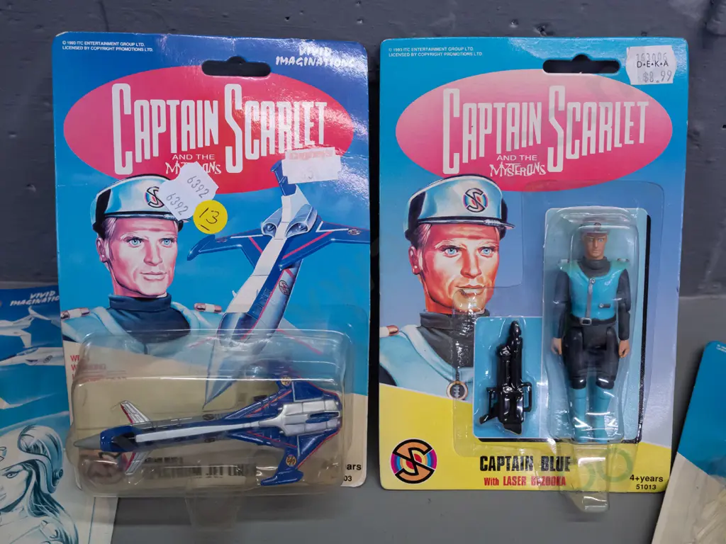6 carded Captain Scarlett toys in original packaging -   Captain Blue with laser bazooka, Captain Blue's Spectrum Jet Image 1++