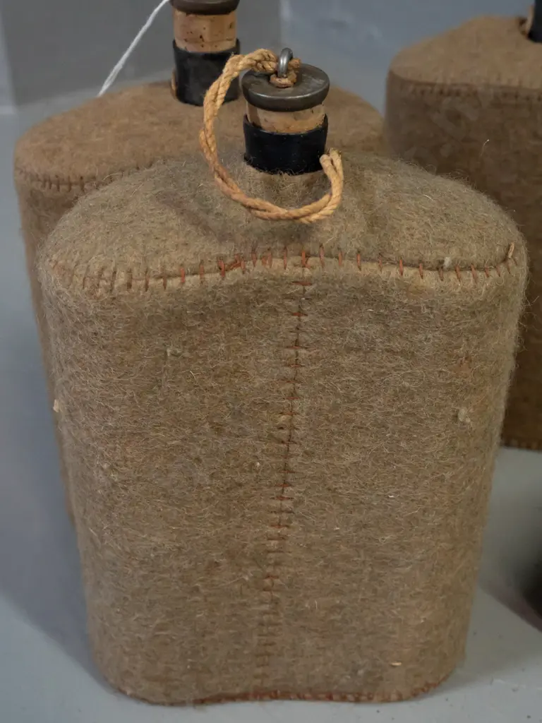 4x WWII-era enameled metal water bottles with felt covers and cork stoppers - insect damage to felt on one. H-210 W-150 Image 1++