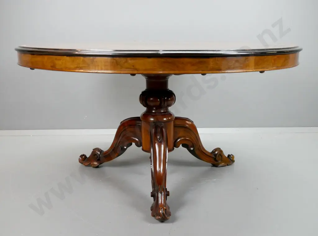 early Victorian walnut round topped centre table with harewood and fruitwood inlaid designs in top, working tilt top Image 1++