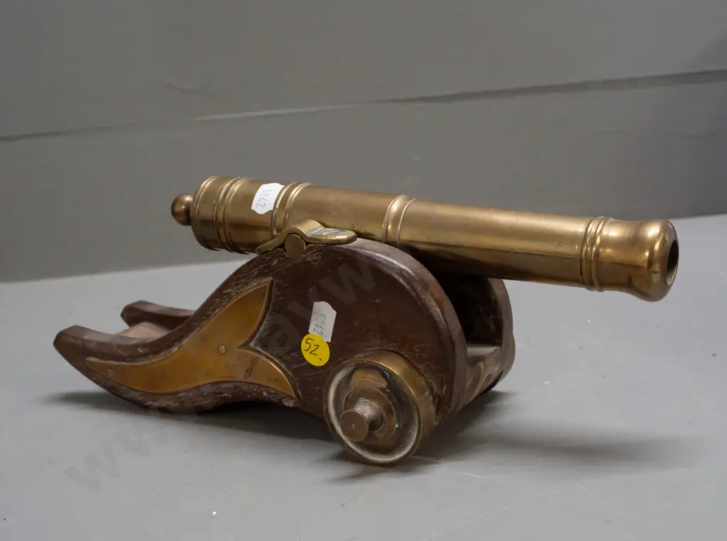 ornamental brass & timber cannon. Some staining & marks to timber. L-300 Image 1++