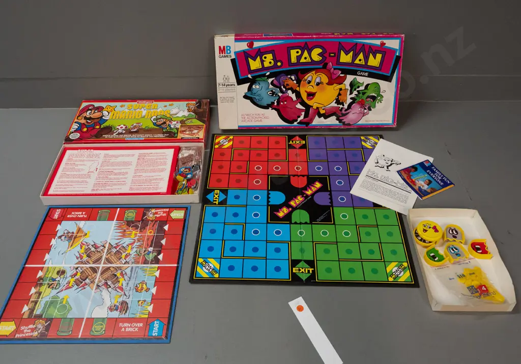 1982 Ms Pac-Man board game and 1992 Waddington's Super Mario Bros. board game - some wear and tear to boxes Image 1++