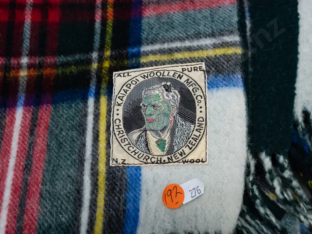tartan woollen travel rug with Kaiapoi Woollen Christchurch Maori chief label - small area of wear, minor spot staining Image 1++