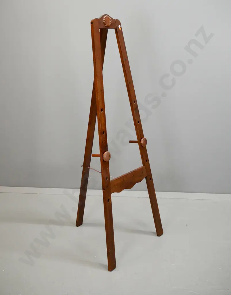 reproduction easel with antiqued surface, turned knob supports, shell motif at top. Loose joints & hinge could use some Image 1++