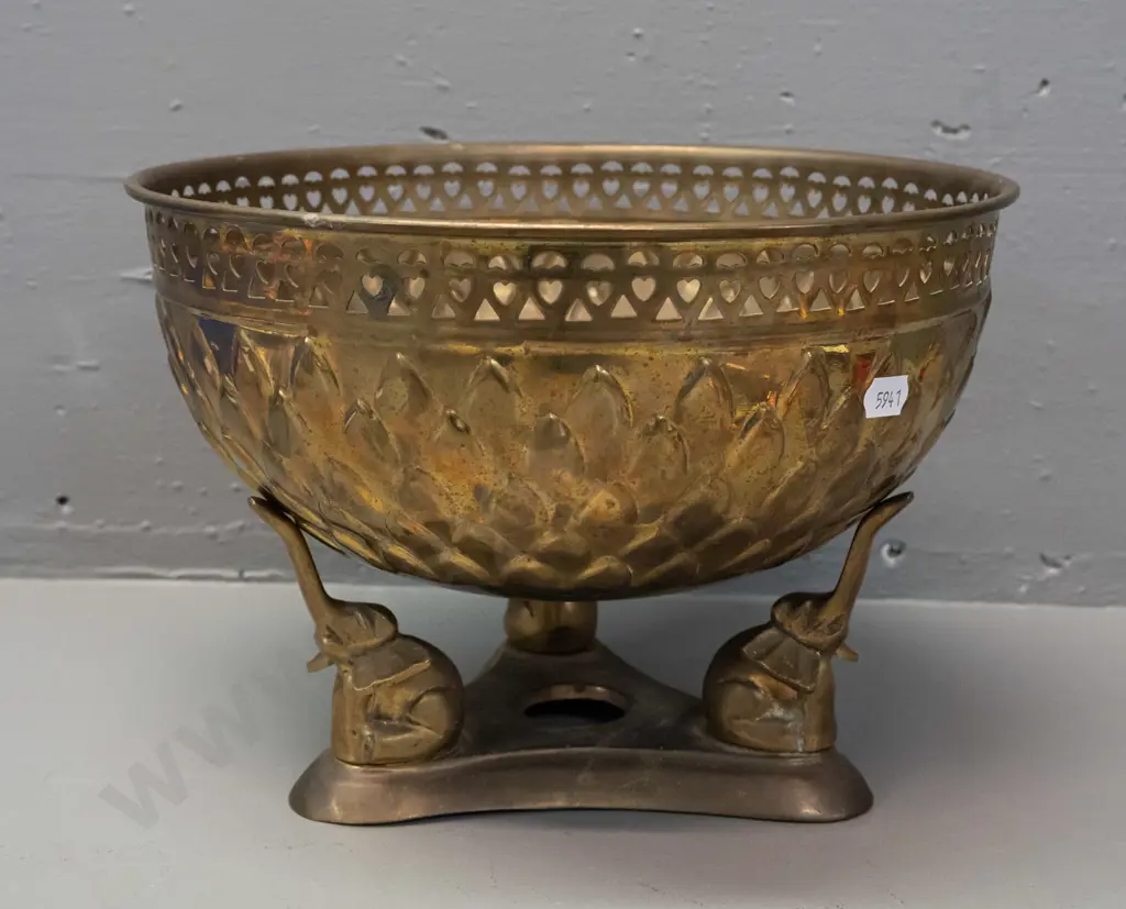 brass bowl with pierced top rim, beaten motifs, rounded bottom on tri-form base with elephant supports - some dis- Image 1++