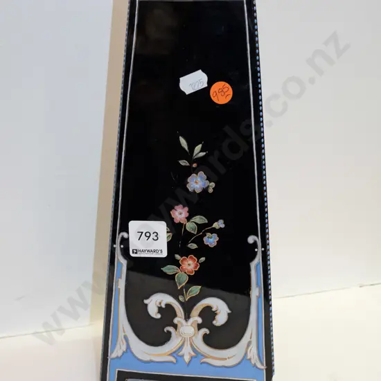 triangular tapered black glass vase with floral
