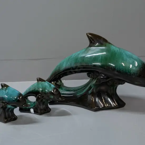 3 Blue Mountain pottery leaping dolphins - large H-250 L-410 (some sticker residue) and a pair of small