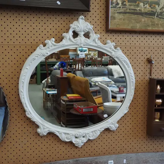 ornate white framed wall mirror