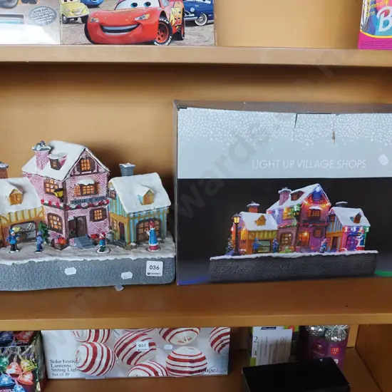 boxed illuminated Xmas village shops
