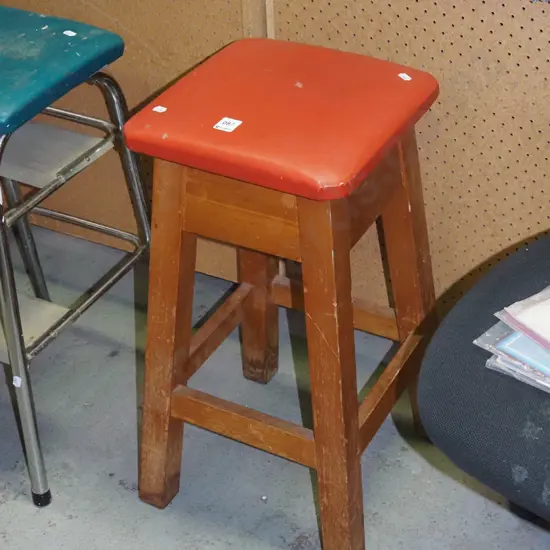 red vinyl topped rimu stool