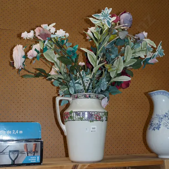 floral water jug faux flowers