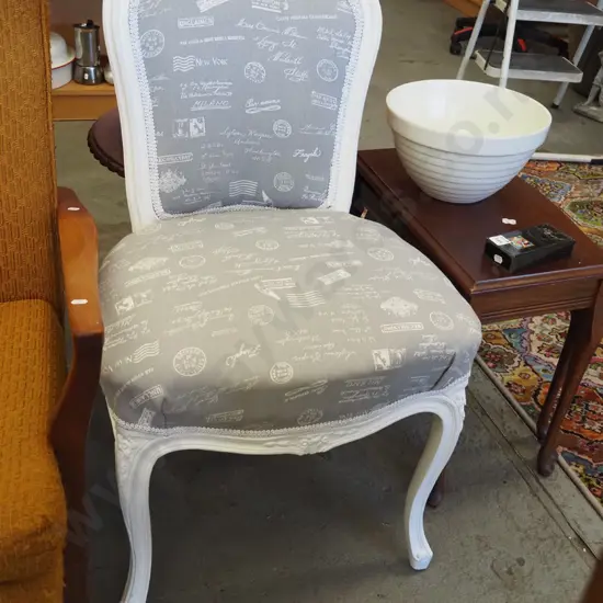 white painted French themed upholstered cab leg chair