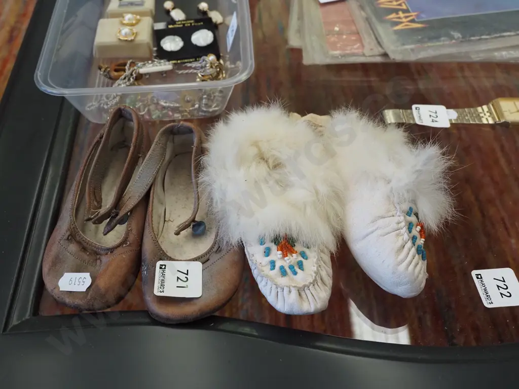 pair of child's shoes and moccasins Image 1++